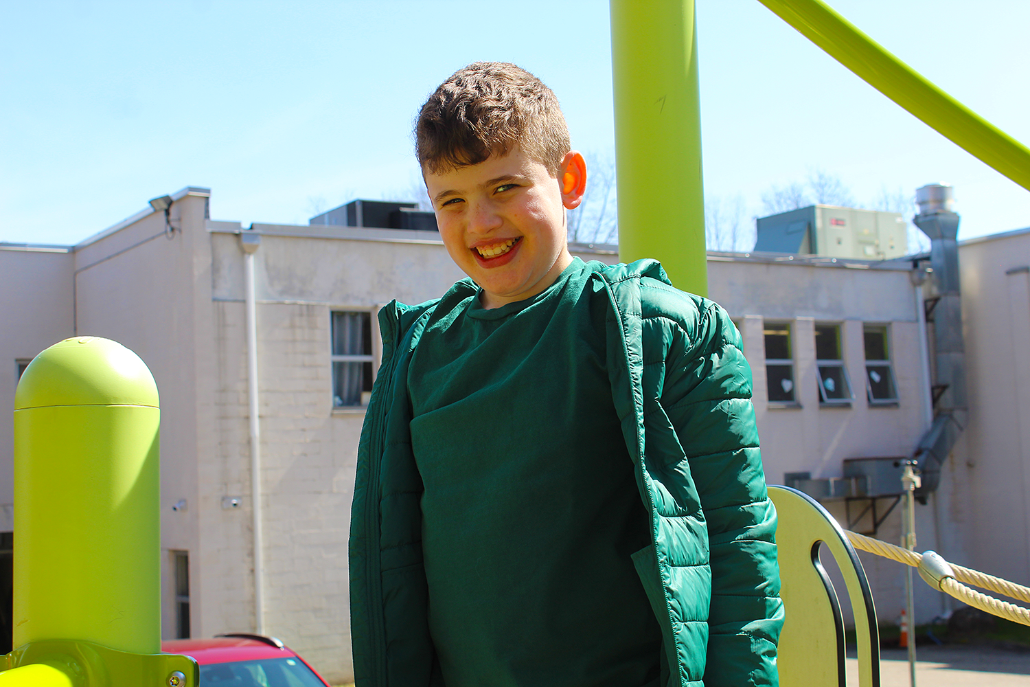 male student in school yard