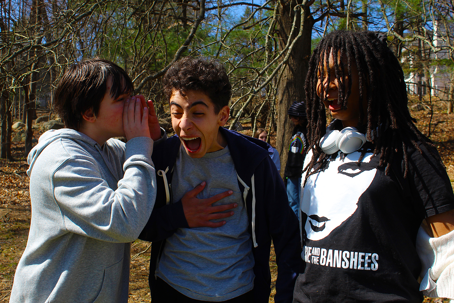 three students in playground